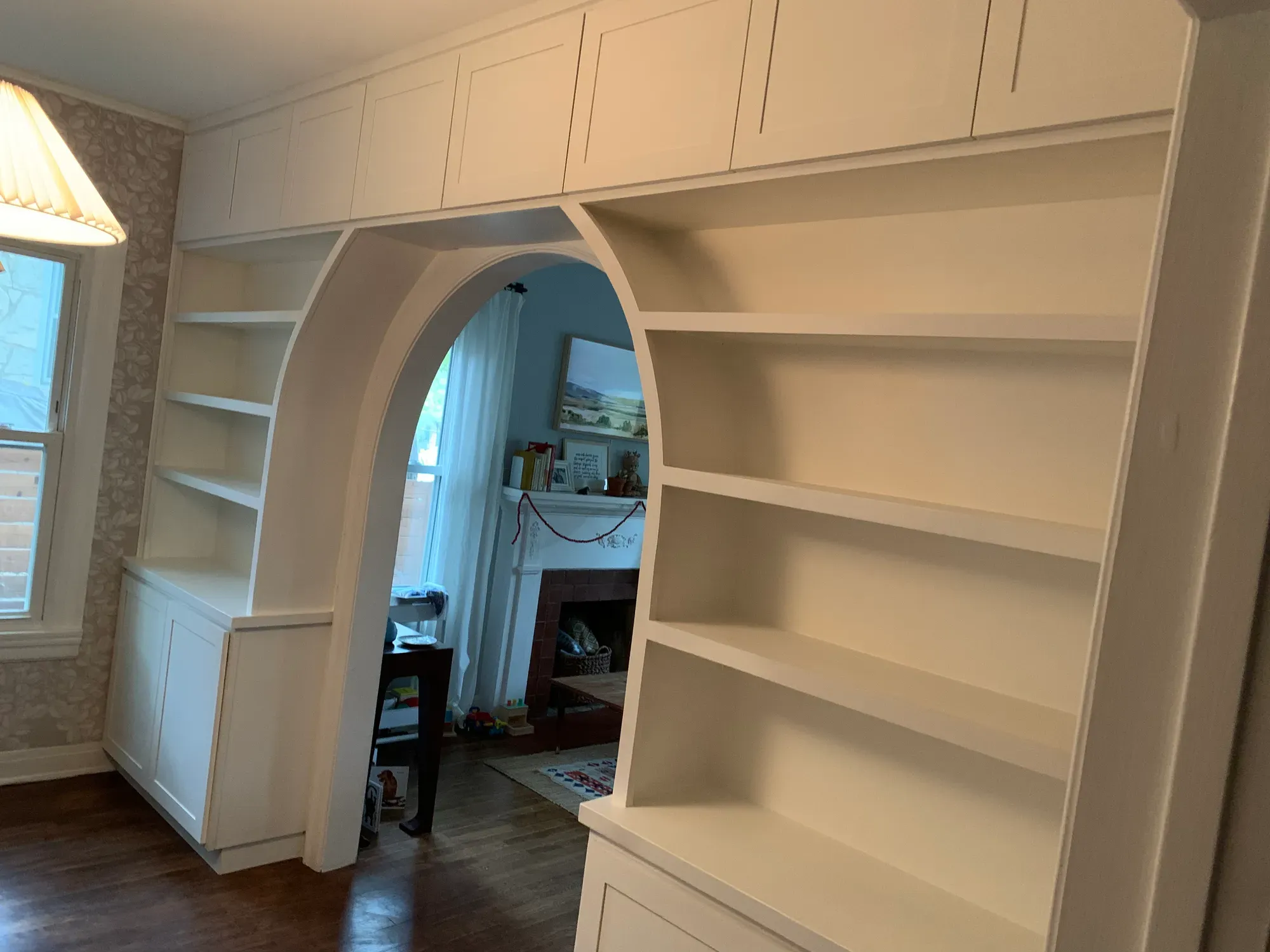 Arched custom built-in with shelving in Austin, Texas