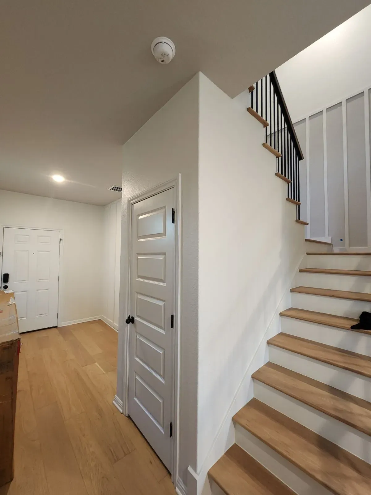 Engineered hardwood flooring and solid wood stair