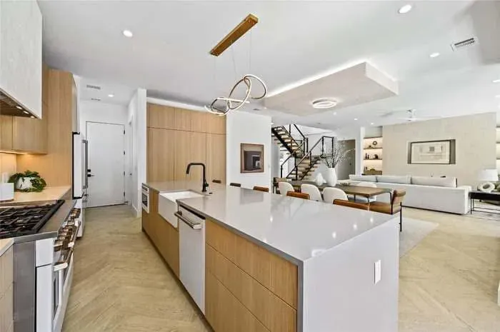 White quartz countertops in an open plan Austin kitchen