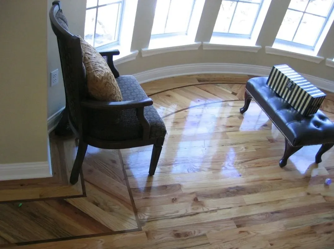 Oak hardwood floor with a walnut inlay