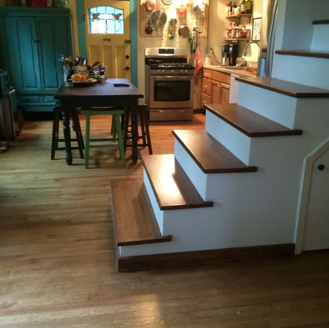 oak floor and stair treads with medium brown stain